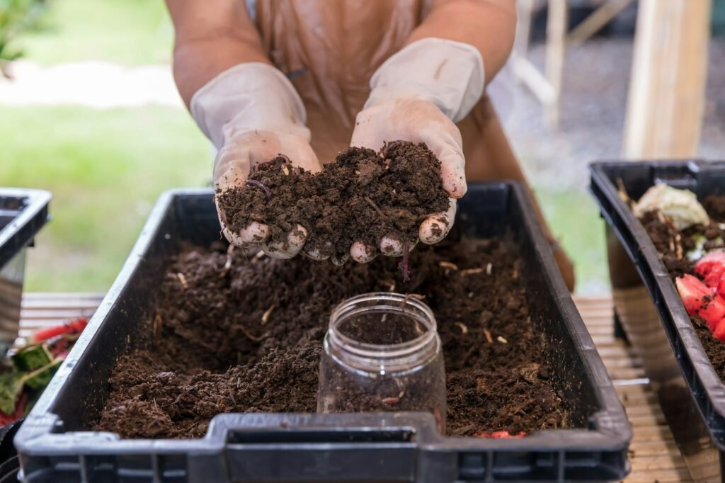 Earthworms on hand for organic fertilizer farming concept